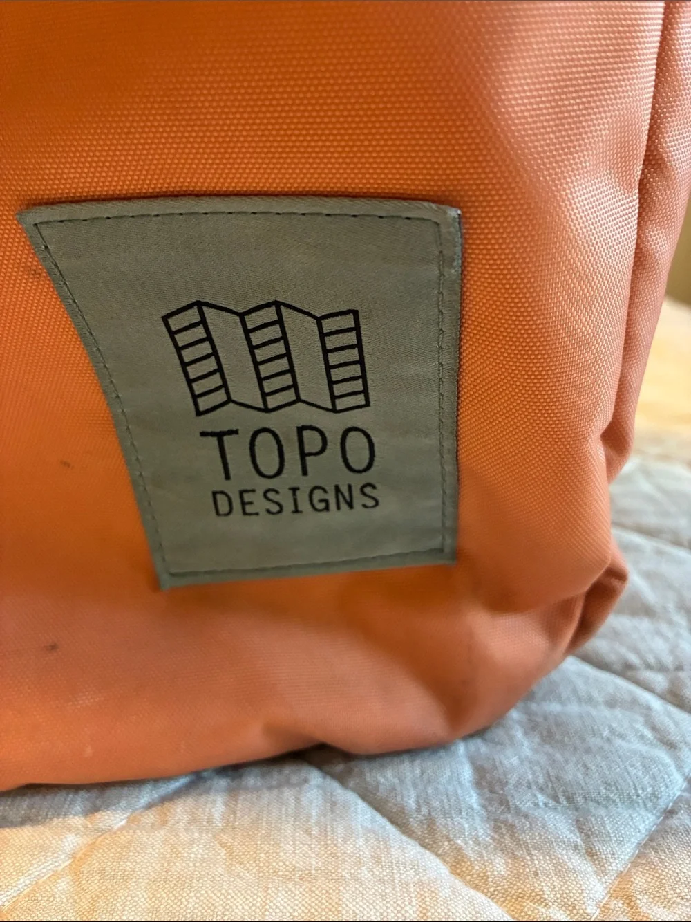 Topo Designs Orange and Mauve Two-Tone Light Pack Backpack
